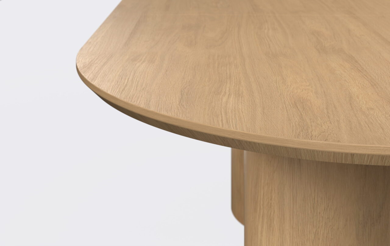 Owalny stół do jadalni o minimalistycznym designie.