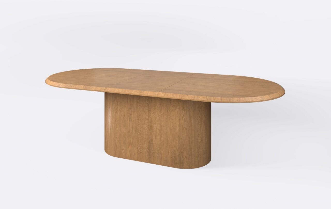 Owalny stół do salonu, poszerzony o jedną wkładkę.