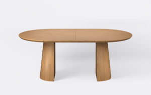 Stół owalny rozkładany na dwóch nogach, fornirowany dębowy.