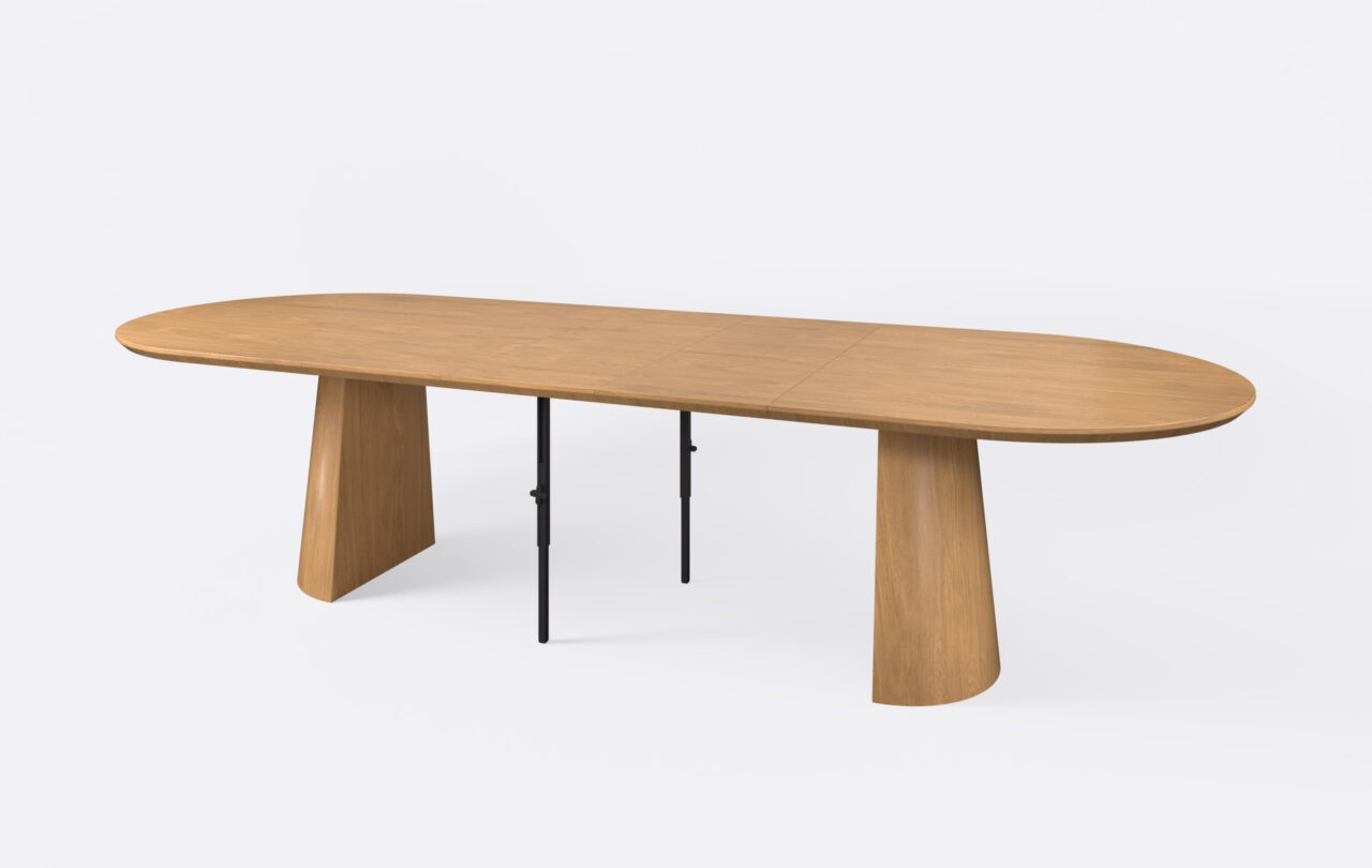 Stół owalny na dwóch nogach, fornirowany dębowy, rozłożony i poszerzony o dwa dodatkowe wkłady.