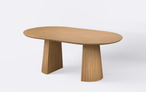 Stół owalny na dwóch podstawach z lamelami, posiada funkcję rozkładania.