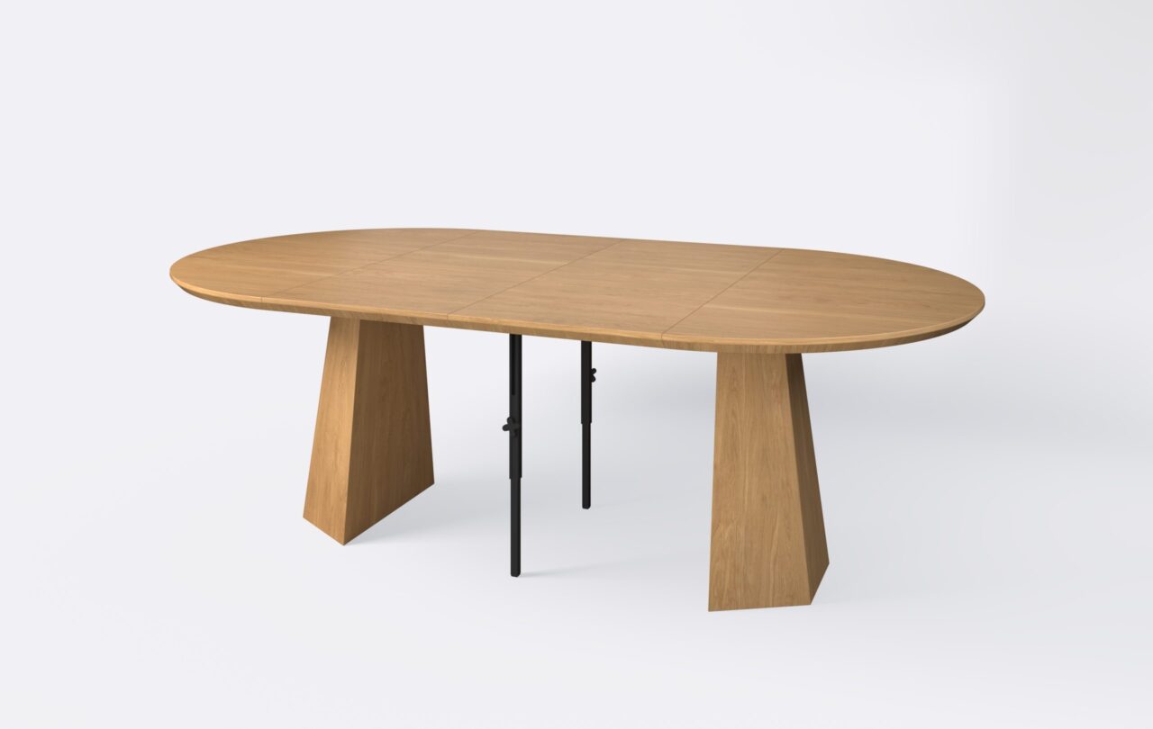 Okrągły stół w stylu boho z funkcją rozkładania, poszerzony o dwie wkładki.