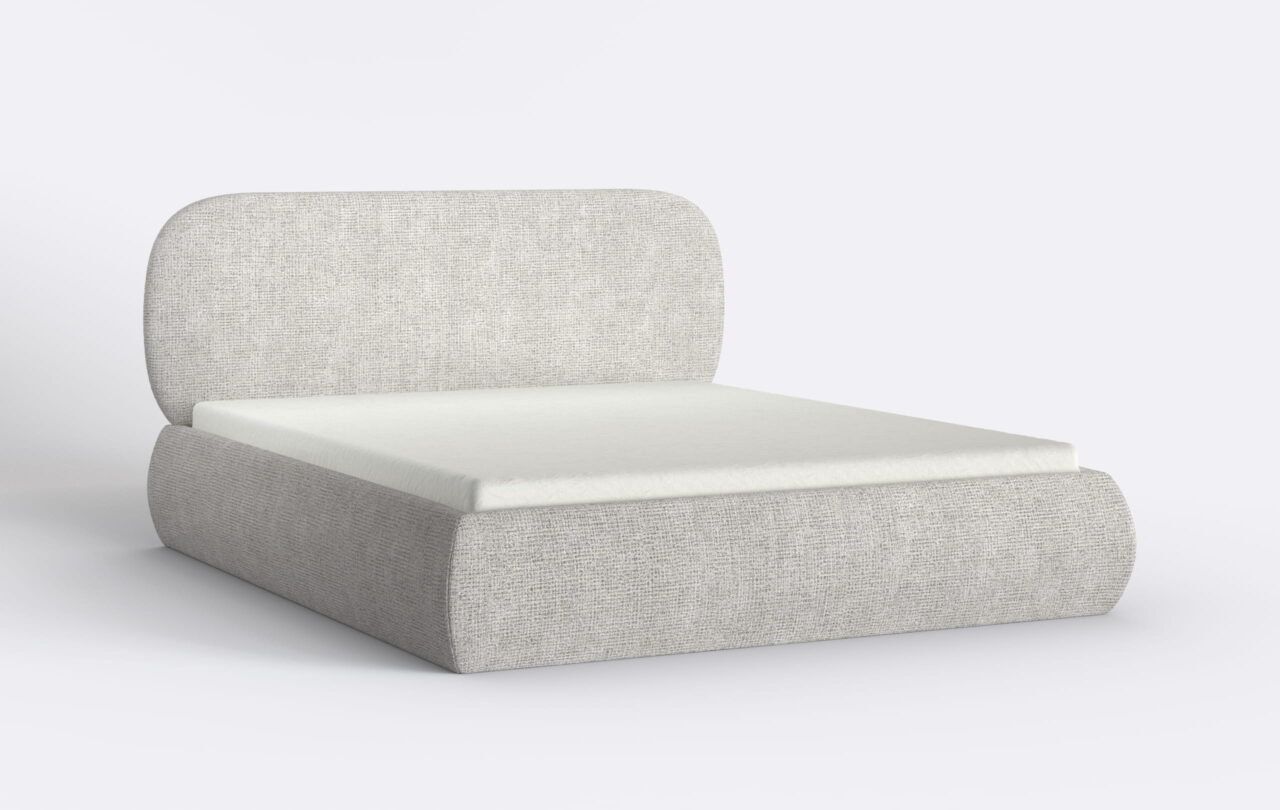 Łóżko do sypialni tapicerowane z materacem.