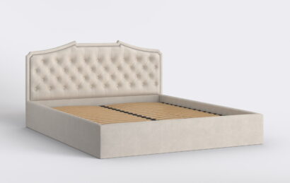 Łóżko tapicerowane pikowane w kolorze beżowym.