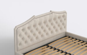 Łóżko z pikowanym wezgłowiem, beżowe, idealne do sypialni w stylu glamour.