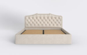Beżowe łóżko do sypialni pikowane, z metalowym stelażem i pojemnikiem na pościel.