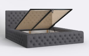 Pikowane łóżko tapicerowane z podnoszonym stelażem.