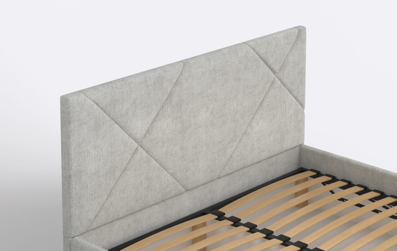 Nowoczesne łózko z tapicerowanym wezgłowiem.