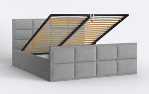 Szare łózko sypialniane z podnoszonym stelażem i pojemnikiem.