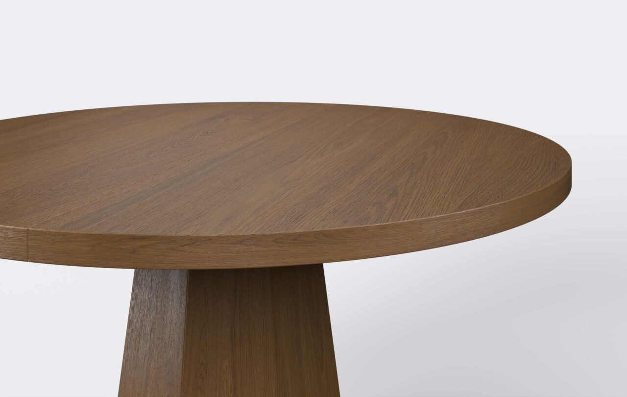 Stół z okrągłym blatem o grubości czterech centymetrów, krawędź prosta, wykonany z forniru dębowego.