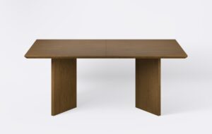 Nowoczesny stół na dwóch nogach, blat z forniru.