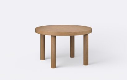 Modernistyczny dębowy stół z okrągłym blatem, z funkcją rozkładania, fornirowany, minimalistyczny.