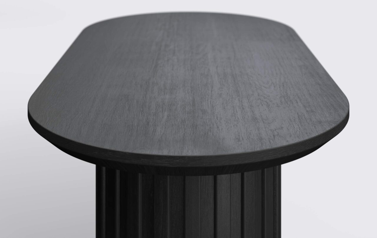 Blat stolika z podciętym blatem od dołu, czarny stolik, owalny.