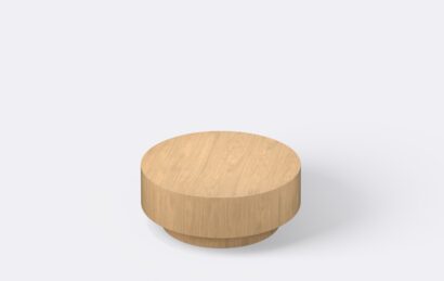 Minimalistyczny okrągły stolik kawowy, niski, gruby blat.