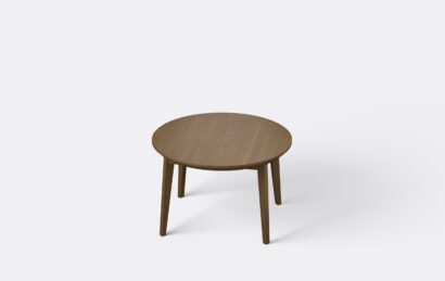 Nowoczesny stolik kawowy z okrągłym blatem, wykonany z forniru.