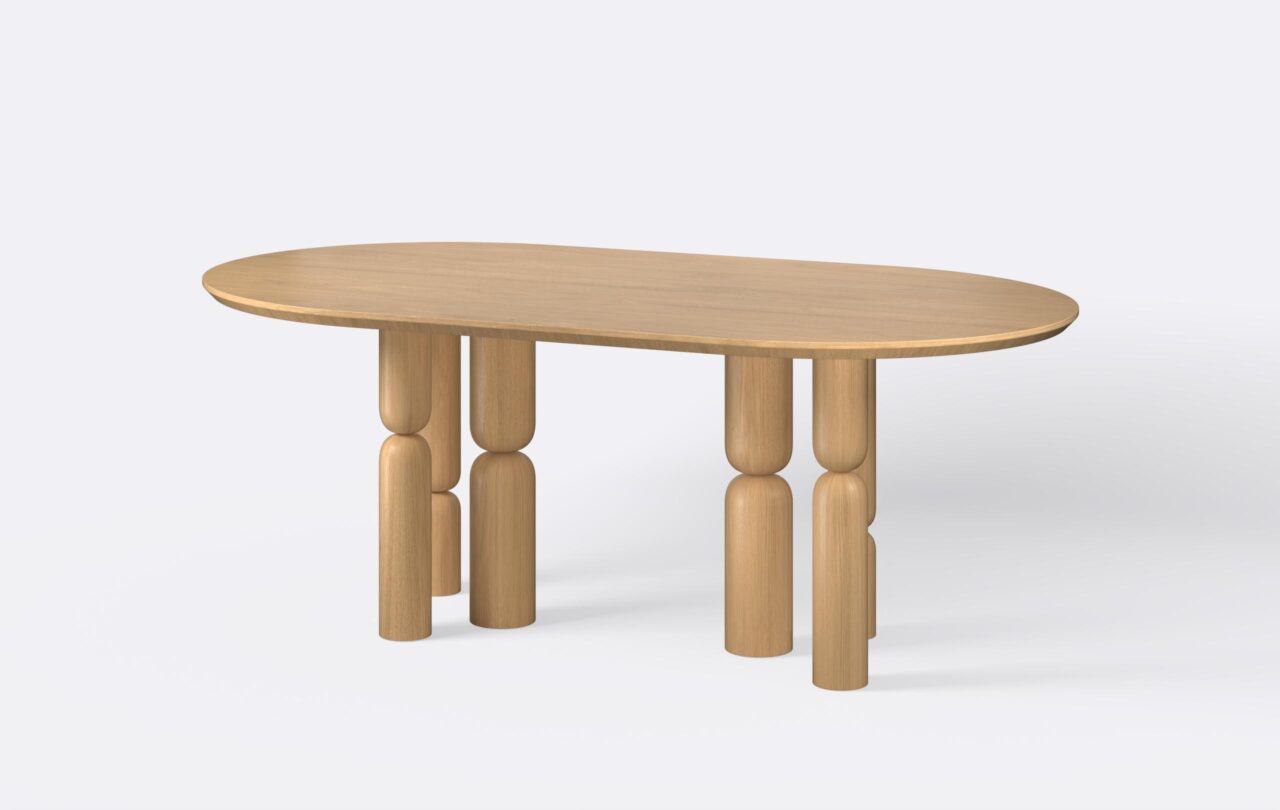 Obły stół na sześciu nogach, wykończony w stylu japandi.