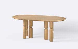 Obły stół na sześciu nogach, wykończony w stylu japandi.