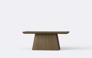 Nowoczesny stolik kawowy na jednej nodze, idealny do dużego salonu.