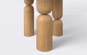 stół do jadalni na trzech nogach, frezowane nogi w stylu japandi.