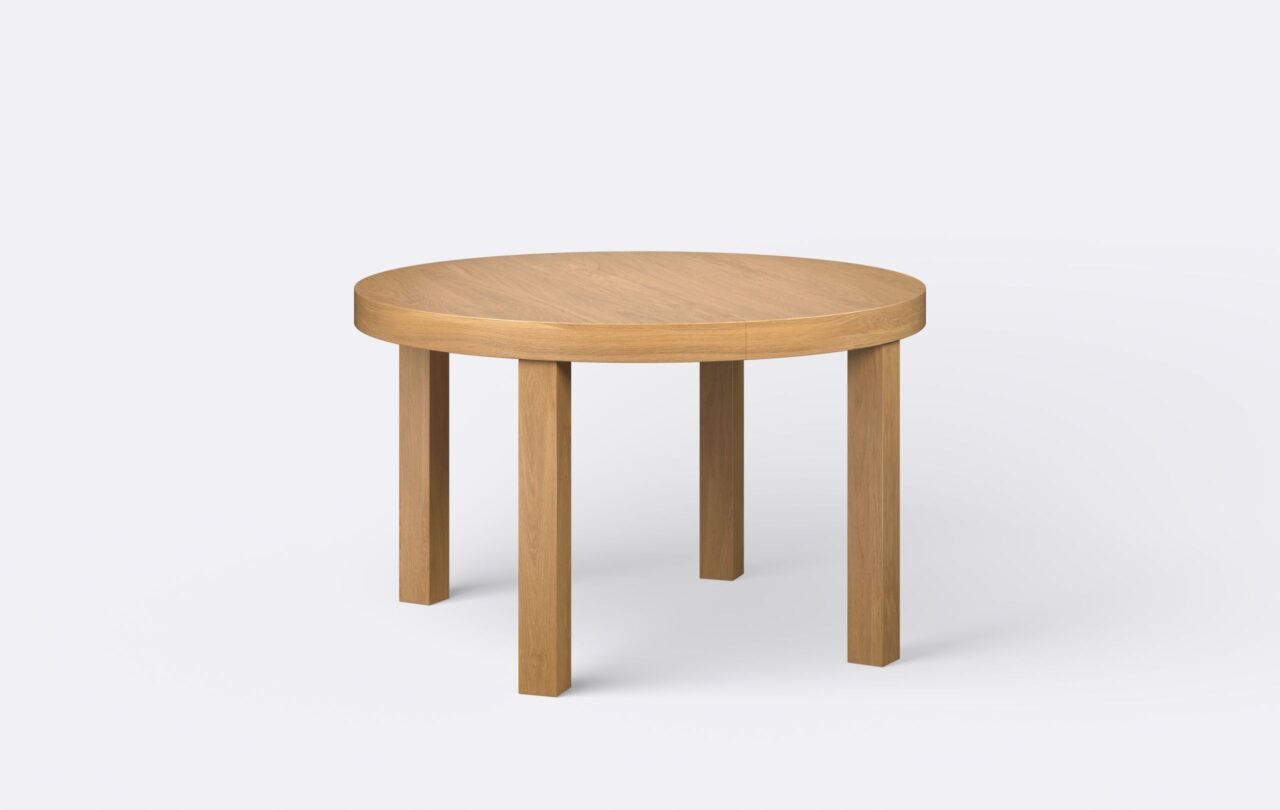 Klasyczny stół na okrągłych nogach, z funkcją rozkładania, wykonany z naturalnego forniru dębowego, marki Borme, o jasnej kolorystyce.